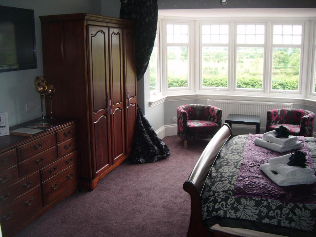 Grimscote Manor Hotel Coleshill Oda fotoğraf